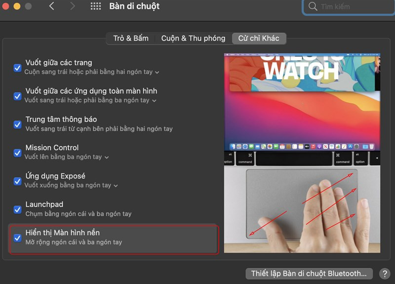 alt text: Minh họa thao tác hiển thị màn hình nền trên Trackpad