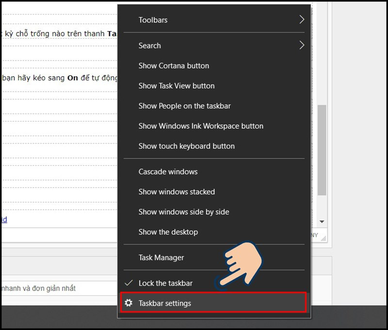 Click chuột phải vào vùng trống trên thanh Taskbar và chọn Taskbar settings.