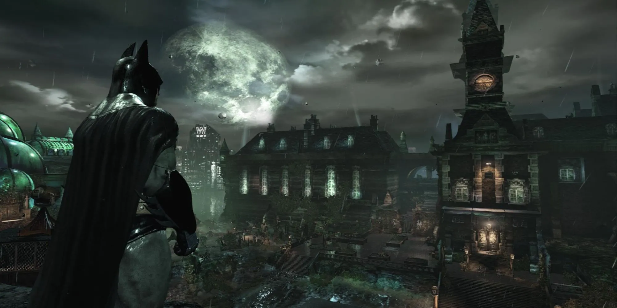 Batman đứng trong hành lang u tối của Arkham Asylum