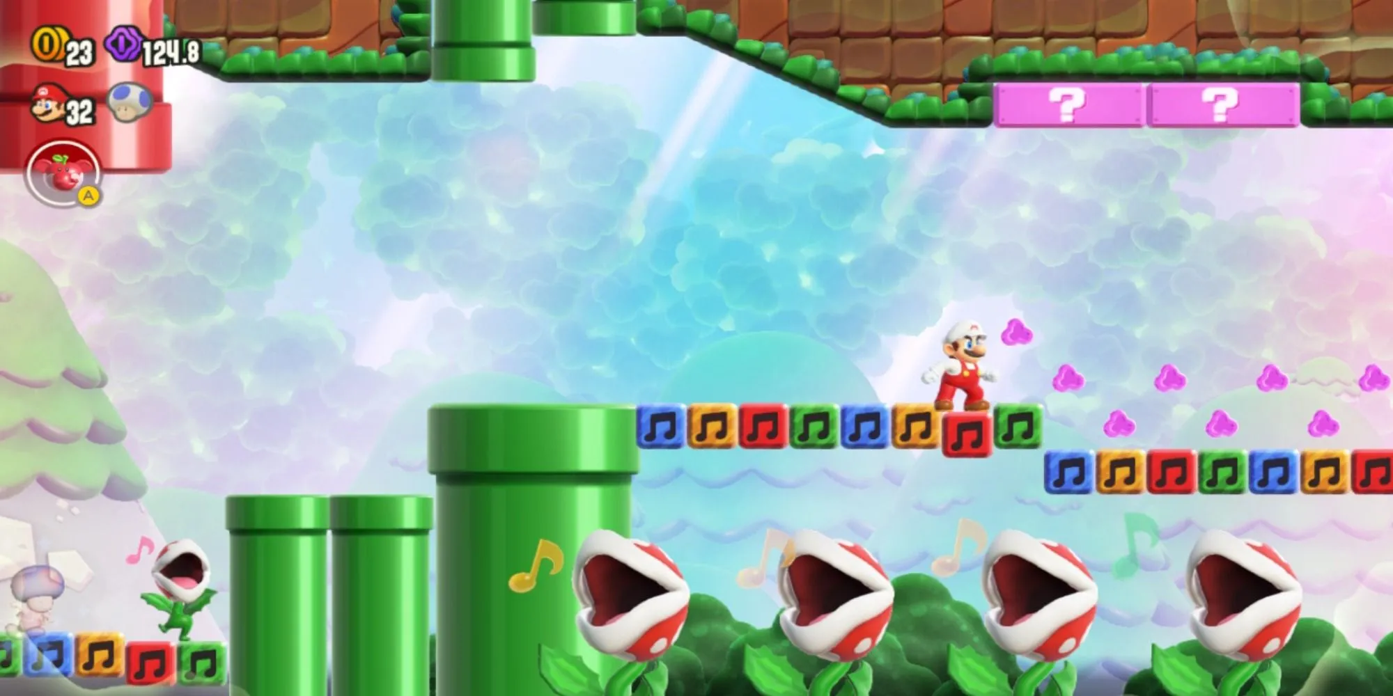 Các nhân vật Mario, Luigi, Peach và Toad vượt qua chướng ngại vật trong một màn chơi đầy màu sắc của Super Mario Bros Wonder