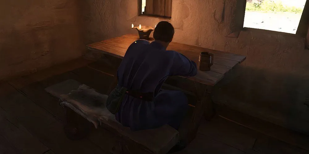 Chernik ngồi trong quán rượu ở Bylany, Kingdom Come Deliverance 2