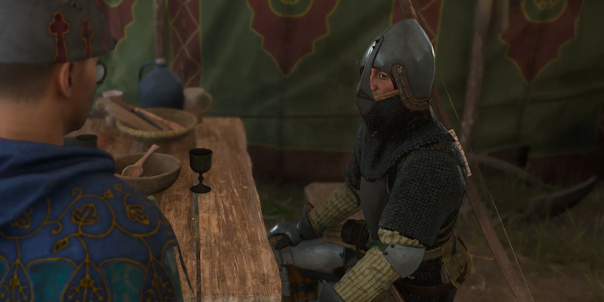 Henry gặp Captain Puta tại trại Sigismund để bắt đầu nhiệm vụ Spoils of War trong Kingdom Come Deliverance 2