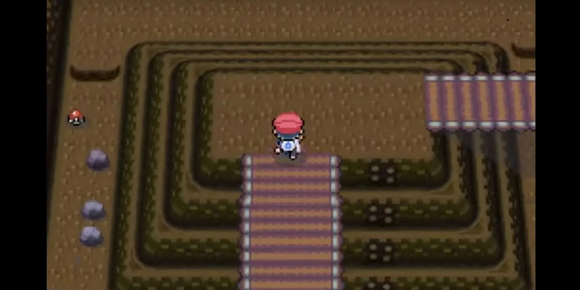 Khung cảnh đường Victory Road trong game Pokemon Platinum trên Nintendo DS, thể hiện môi trường phiêu lưu cổ điển.
