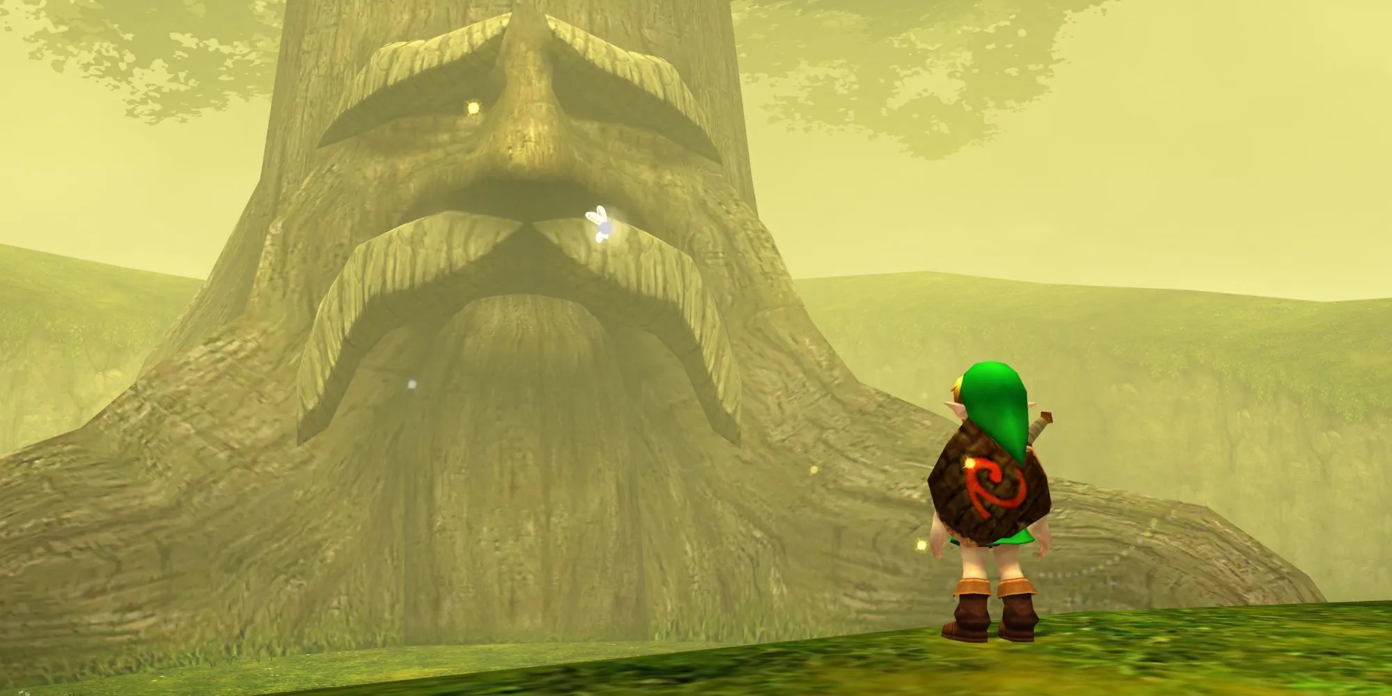 Link đối thoại cùng Cây Deku trong The Legend of Zelda: Ocarina of Time, khởi đầu cho hành trình giải cứu Hyrule.