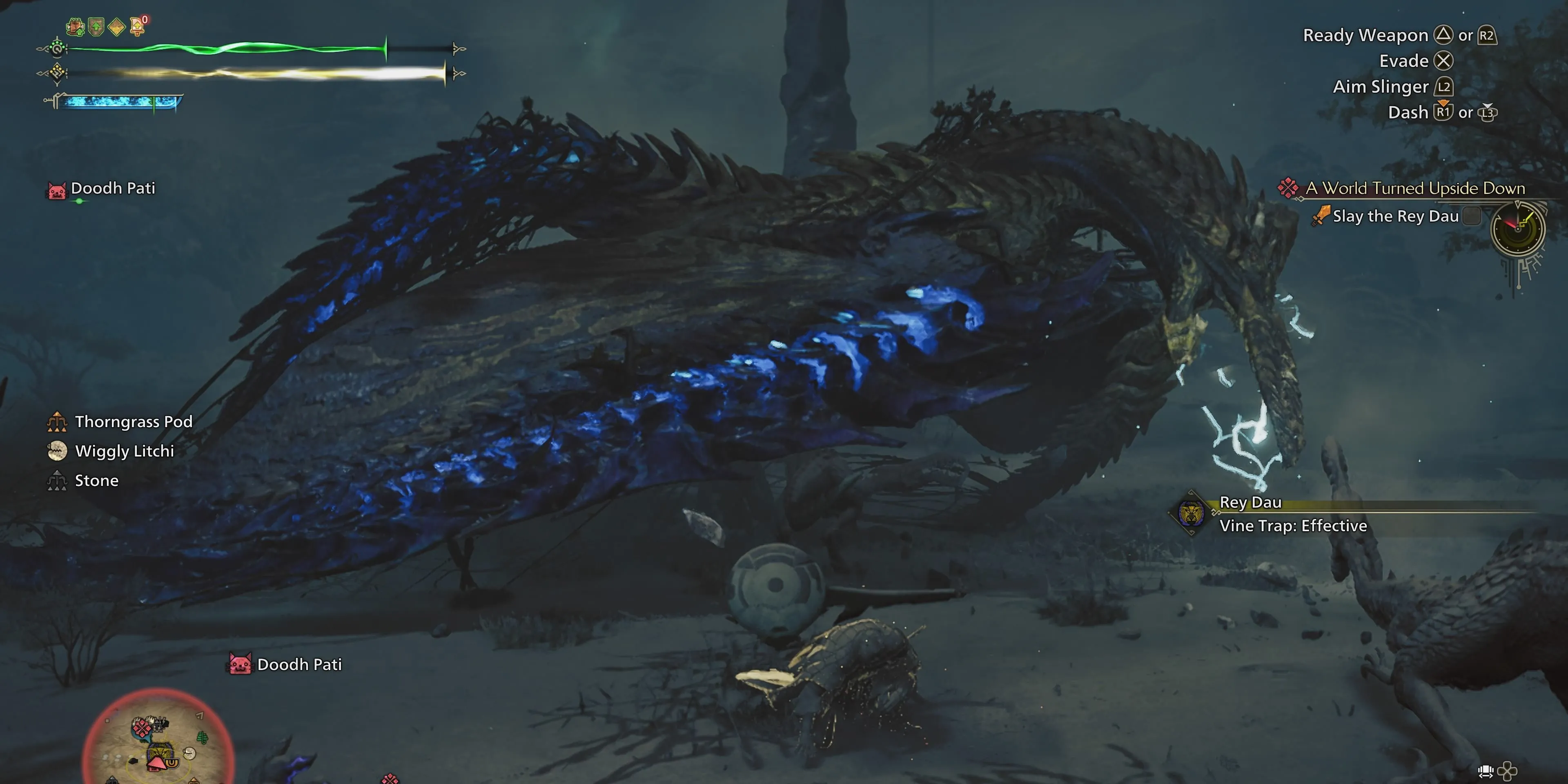 Thợ săn sử dụng bẫy dây leo khống chế quái vật Rey Dau trong Monster Hunter Wilds
