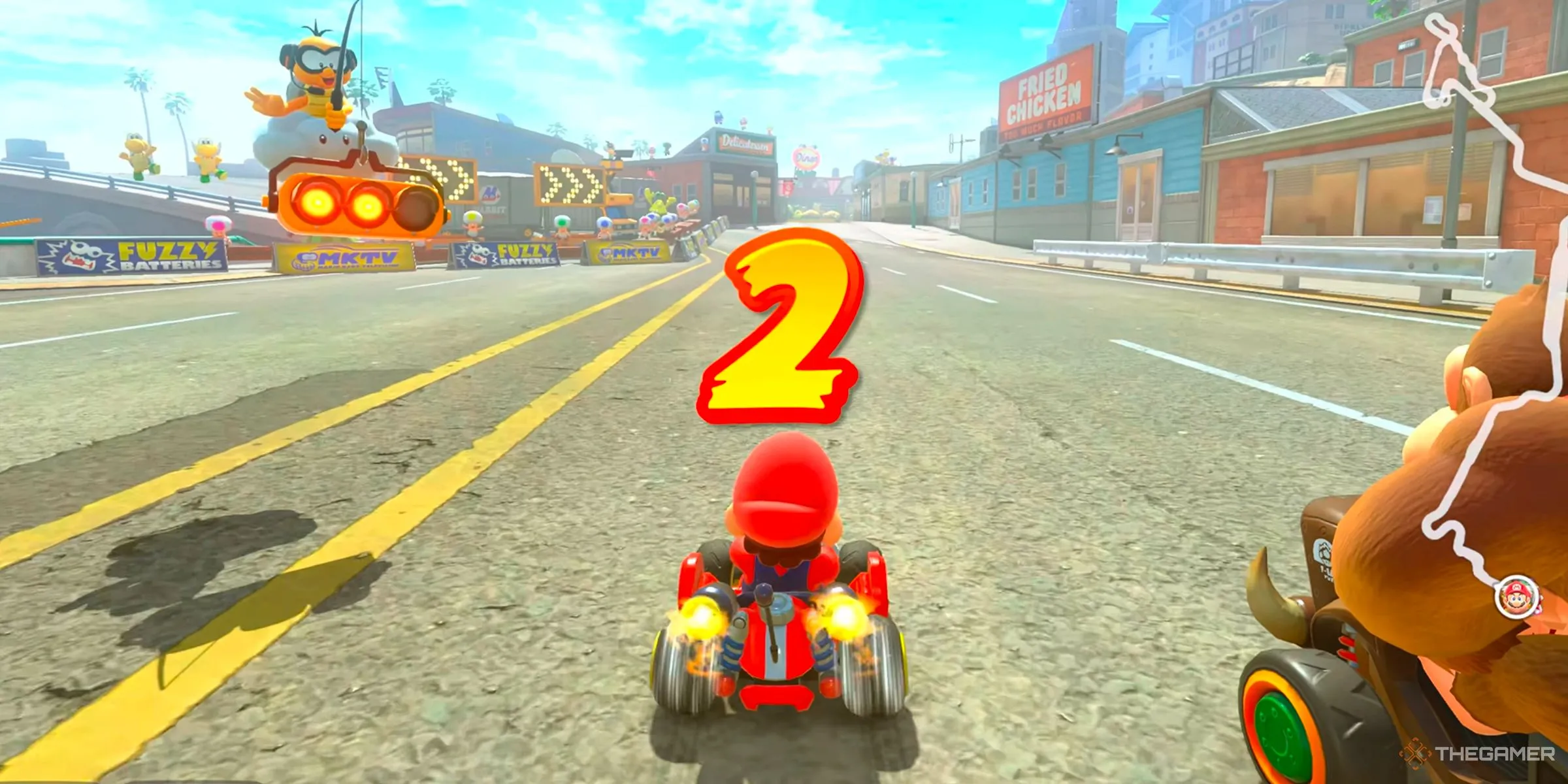 Mario thực hiện Start Boost hoàn hảo bằng cách nhấn A khi đồng hồ đếm ngược hiện số 2 trong Mario Kart World.