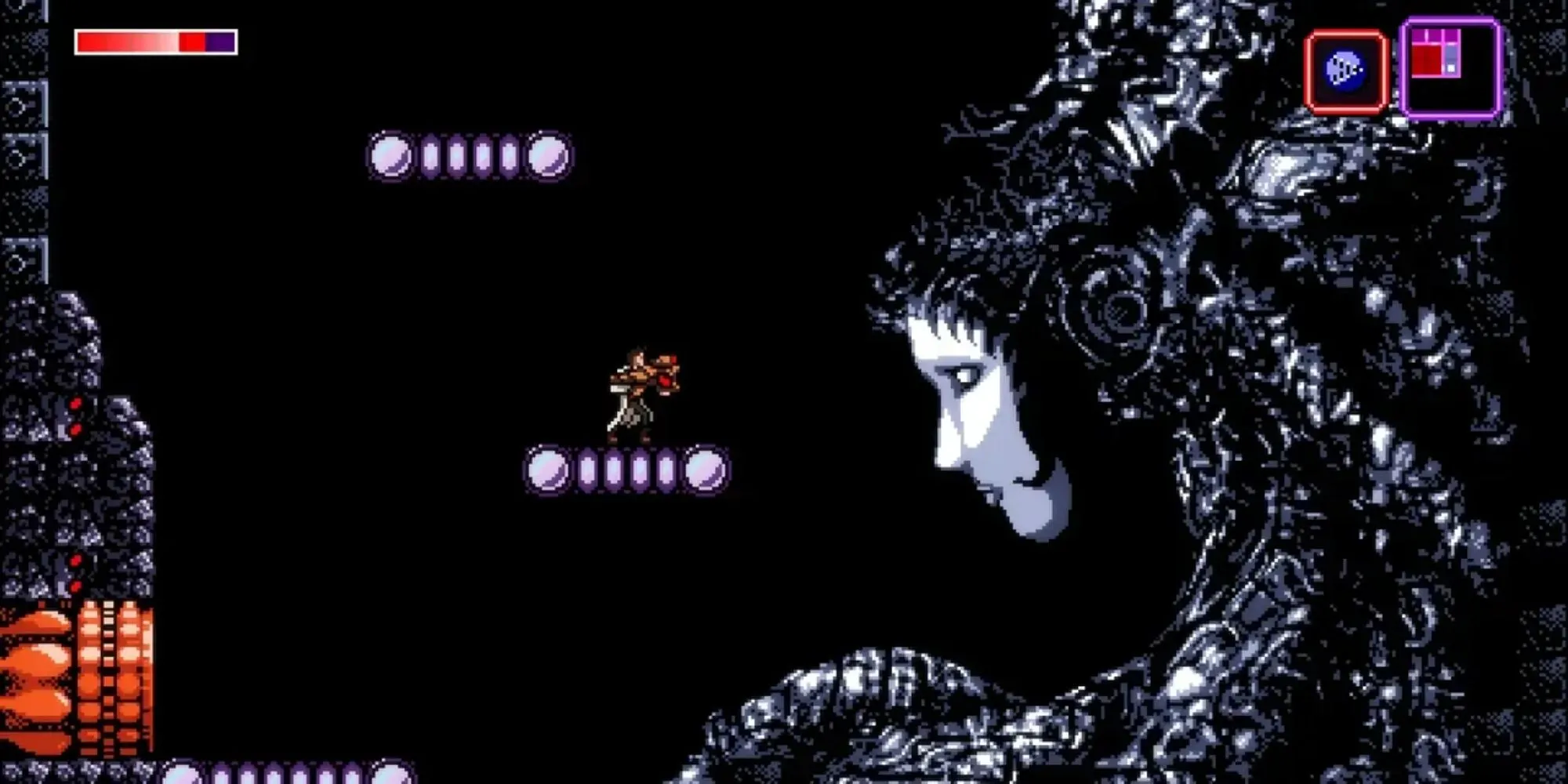 Nhân vật chính Thommas trong Axiom Verge đối mặt với quái vật sinh cơ học trong môi trường pixelated