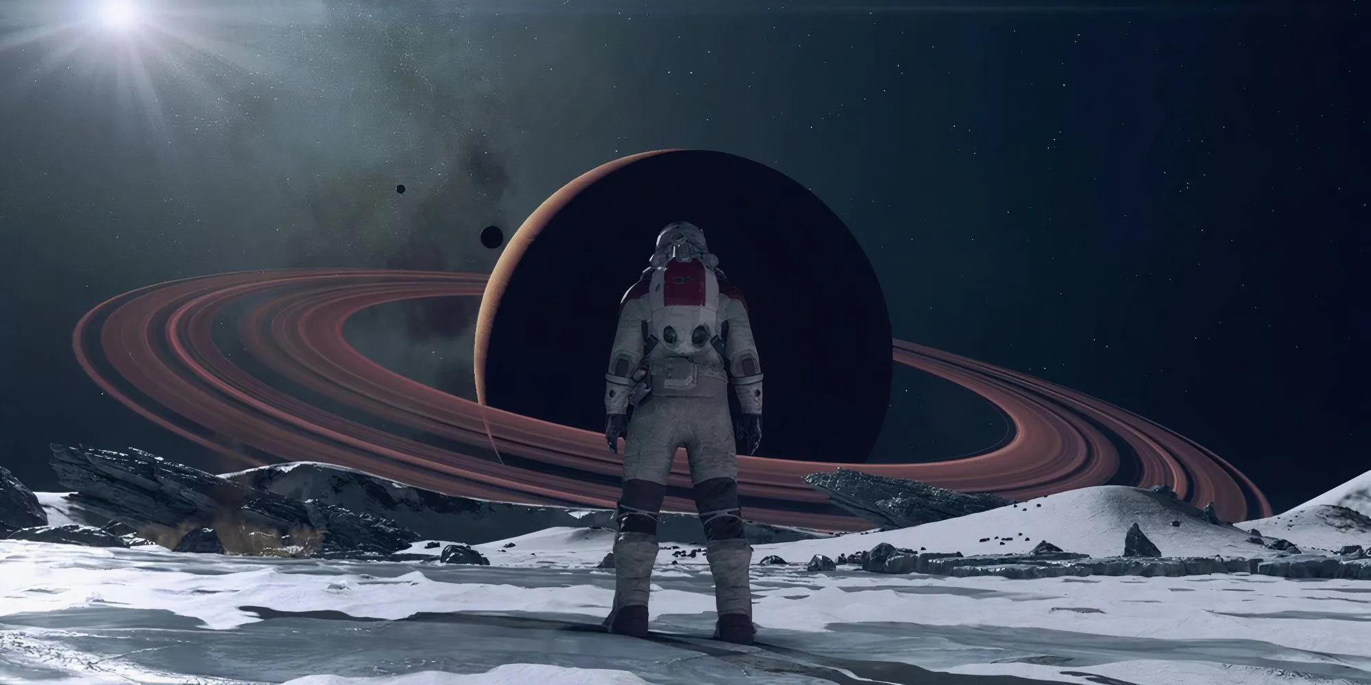 Phi hành gia đứng trước sao Thổ trong Starfield