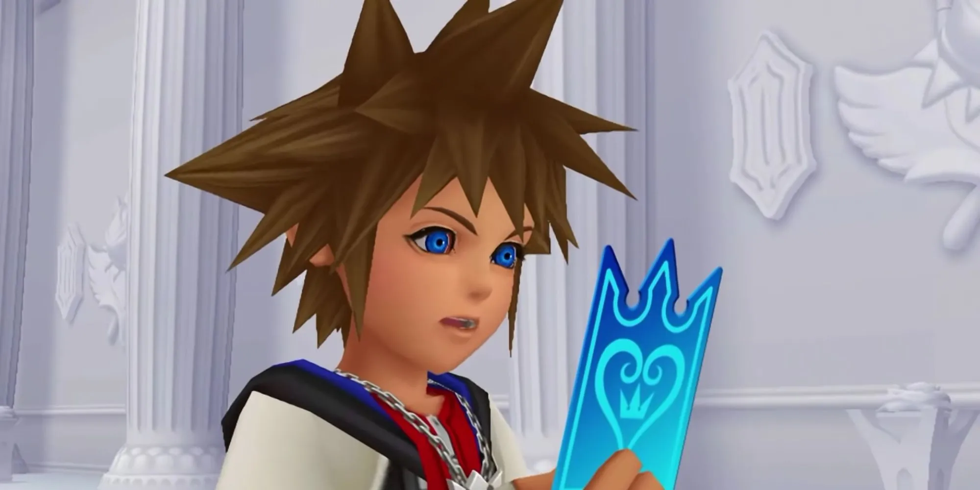 Sora đang nhìn vào một lá bài trong Kingdom Hearts Re: Chain of Memories, tựa game với cơ chế chiến đấu thẻ bài 3D phức tạp và cốt truyện lặp lại, khiến nhiều game thủ dễ dàng bỏ dở.
