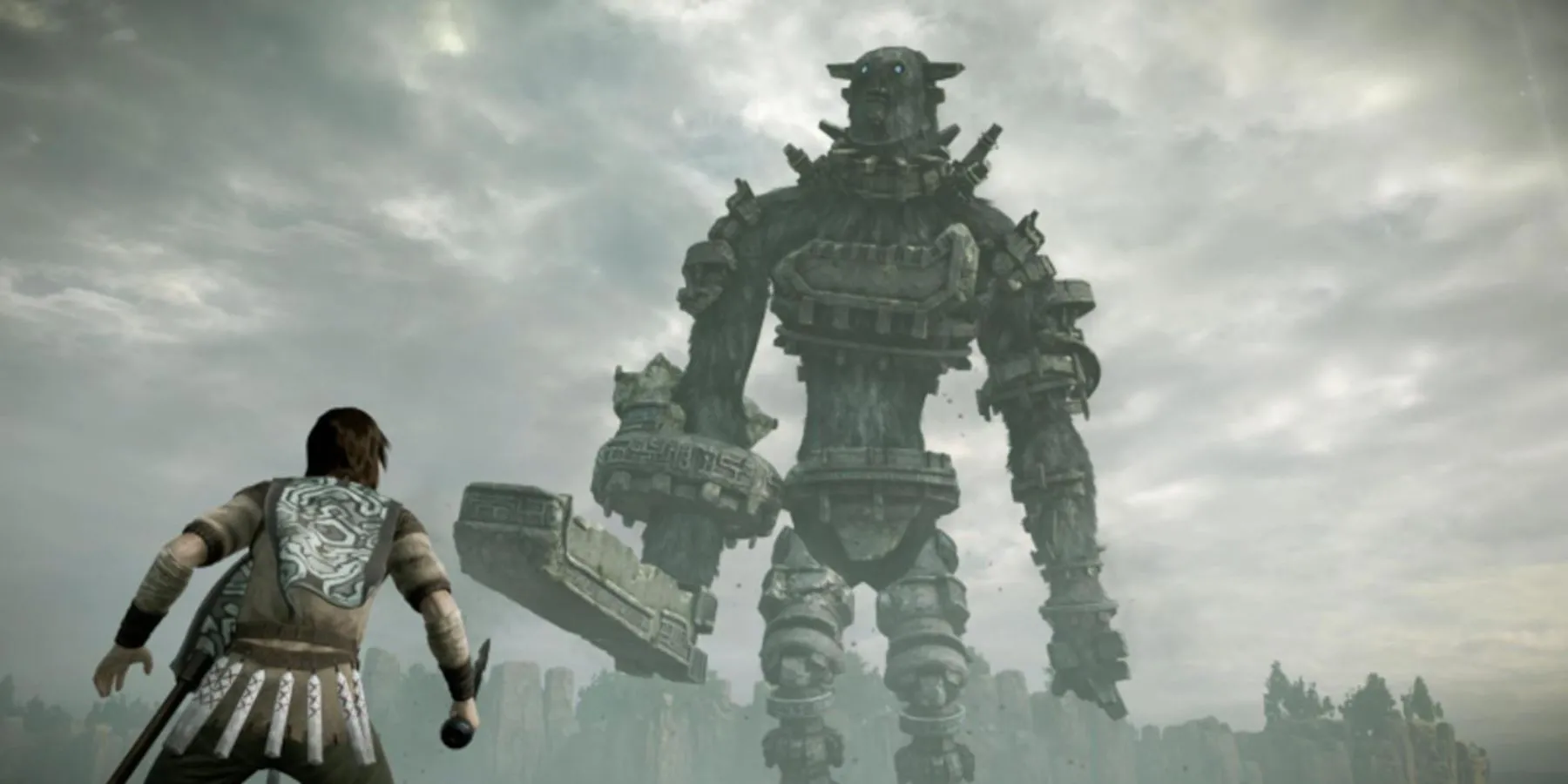 Wander chuẩn bị chiến đấu với một Colossus, thể hiện cơ chế leo trèo phức tạp